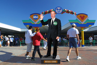 An animatronic Michael Eisner greets visitors outside the entrance to the Whirly Merge.